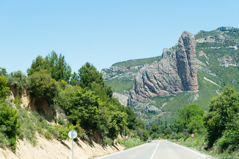 20160601_140800 D4S.jpg - Mallos de Riglos are a set of huge red rock formations that rise up as pillars up to 1000 feet in height.  Its a popular rock climbing place.  Located near Riglos about 25 miles from city of Huesca